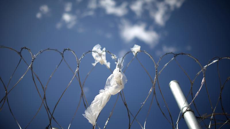 A razor wire fence surrounds the Adelanto immigration detention center, in Adelanto, Calif., April 13, 2017. A razor wire fence surrounds the Adelanto immigration detention center, in Adelanto, Calif., April 13, 2017.