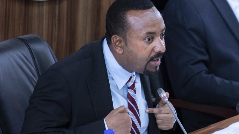 Ethiopian Prime Minister Abiy Ahmed, seen addressing lawmakers Tuesday, won a Nobel Peace Prize less than two weeks ago — but he now appears embroiled in a standoff with the activist who helped bring down the regime before him. Ethiopian Prime Minister Abiy Ahmed, seen addressing lawmakers Tuesday, won a Nobel Peace Prize less than two weeks ago — but he now appears embroiled in a standoff with the activist who helped bring down the regime before him.
