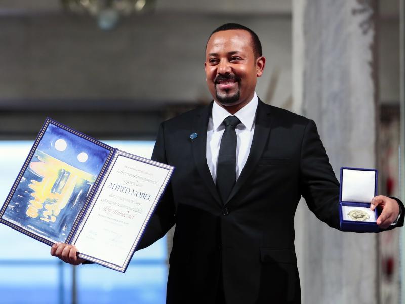 Ethiopia's Prime Minister Abiy Ahmed poses for the media after receiving the Nobel Peace Prize in Oslo, Norway, on Dec. 10, 2019. The Norwegian Nobel Committee on Thursday issued a very rare admonition to Abiy over the war and humanitarian crisis in his Ethiopia's Prime Minister Abiy Ahmed poses for the media after receiving the Nobel Peace Prize in Oslo, Norway, on Dec. 10, 2019. The Norwegian Nobel Committee on Thursday issued a very rare admonition to Abiy over the war and humanitarian crisis in his