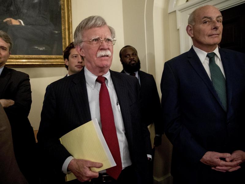 National security adviser John Bolton, center, and President Trump's chief of staff John Kelly, right, attend a Cabinet meeting in the White House, Tuesday, last month. National security adviser John Bolton, center, and President Trump's chief of staff John Kelly, right, attend a Cabinet meeting in the White House, Tuesday, last month.