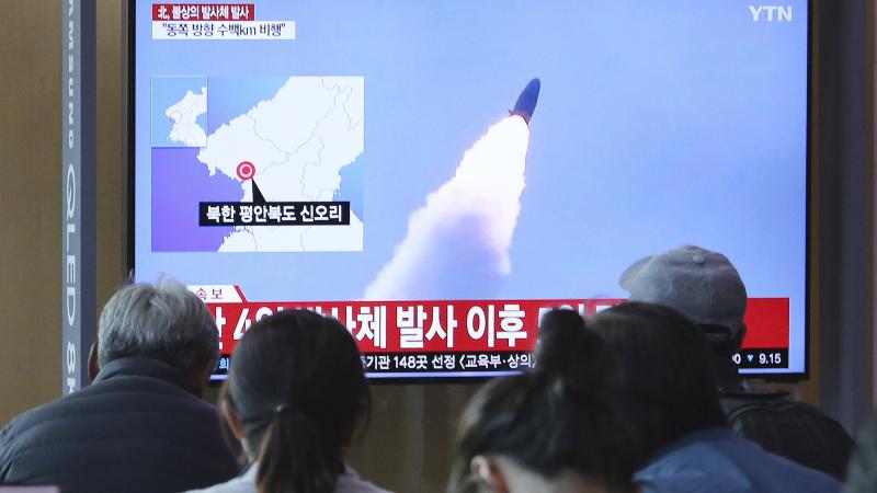 North Korea on Thursday fired projectiles that are believed to be missiles from the country's western area, South Korea's military says. The same day in Seoul, people watch a TV showing footage of a previous missile launch by North Korea. North Korea on Thursday fired projectiles that are believed to be missiles from the country's western area, South Korea's military says. The same day in Seoul, people watch a TV showing footage of a previous missile launch by North Korea.