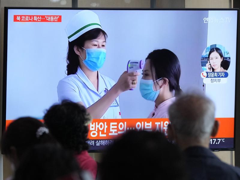 People watch a TV screen showing a news report about the COVID-19 outbreak in North Korea, at a train station in Seoul, South Korea, Saturday, May 14, 2022. North Korea on Saturday reported 21 new deaths and 174,440 more people with fever symptoms as the People watch a TV screen showing a news report about the COVID-19 outbreak in North Korea, at a train station in Seoul, South Korea, Saturday, May 14, 2022. North Korea on Saturday reported 21 new deaths and 174,440 more people with fever symptoms as the