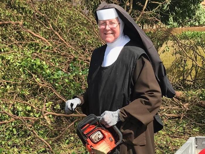Sister Margaret Ann was spotted at work, chainsaw in hand, by an off-duty officer of the Miami-Dade Police Department. Sister Margaret Ann was spotted at work, chainsaw in hand, by an off-duty officer of the Miami-Dade Police Department.