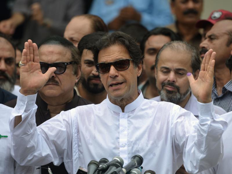 Pakistan's cricket star turned politician Imran Khan speaks to the media after casting his vote in Islamabad on July 25. Pakistan's cricket star turned politician Imran Khan speaks to the media after casting his vote in Islamabad on July 25.