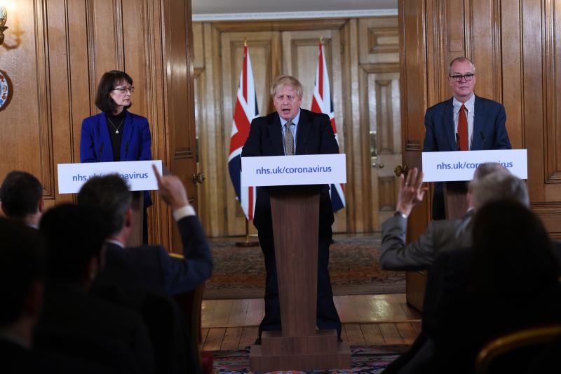 British Prime Minister Boris Johnson, Deputy Chief Medical Officer Dr. Jenny Harries and Chief Scientific Adviser Sir Patrick Vallance at a March news conference on the pandemic. That month, Harries stated that the World Health Organization recommendation British Prime Minister Boris Johnson, Deputy Chief Medical Officer Dr. Jenny Harries and Chief Scientific Adviser Sir Patrick Vallance at a March news conference on the pandemic. That month, Harries stated that the World Health Organization recommendation