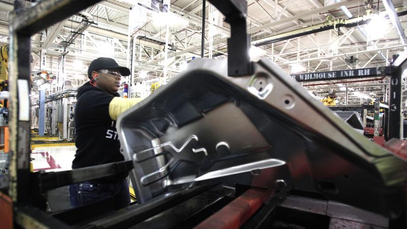 A worker is shown last month at the Fiat Chrysler Automobiles Warren Stamping Plant in Warren, Mich. A worker is shown last month at the Fiat Chrysler Automobiles Warren Stamping Plant in Warren, Mich.