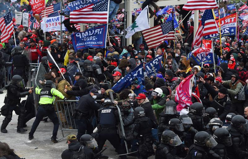 Pro-Trump supporters breeched security and stormed the U.S. Capitol on Jan. 6, 2021. Federal authorities as well as several local departments are looking into whether any off-duty officers were involved in the attack. Pro-Trump supporters breeched security and stormed the U.S. Capitol on Jan. 6, 2021. Federal authorities as well as several local departments are looking into whether any off-duty officers were involved in the attack.