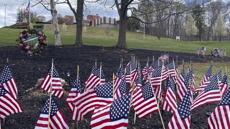 Flags and wreaths honor veterans on April 28, on the grounds of the Soldiers' Home in Holyoke, Mass., where a number of people died due to the coronavirus. While the death toll at the state-run Holyoke Soldiers' Home continues to climb, federal officials Flags and wreaths honor veterans on April 28, on the grounds of the Soldiers' Home in Holyoke, Mass., where a number of people died due to the coronavirus. While the death toll at the state-run Holyoke Soldiers' Home continues to climb, federal officials