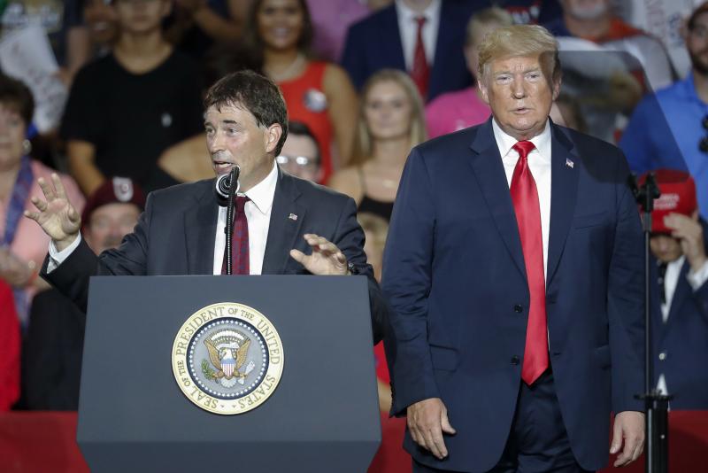 President Trump stands beside Republican Troy Balderson, running in Ohio's 12th Congressional District, during a rally Saturday in Ohio. President Trump stands beside Republican Troy Balderson, running in Ohio's 12th Congressional District, during a rally Saturday in Ohio.