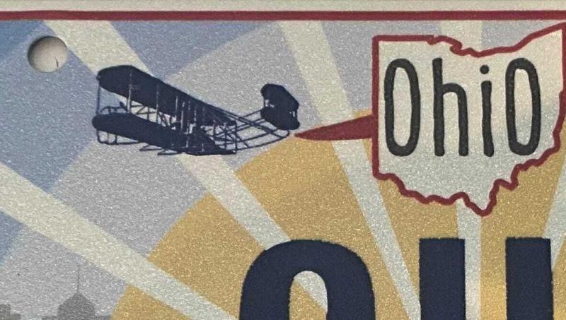 The Wright Flyer as depicted on the new "Sunrise in Ohio" license plate. The Wright Flyer as depicted on the new "Sunrise in Ohio" license plate.