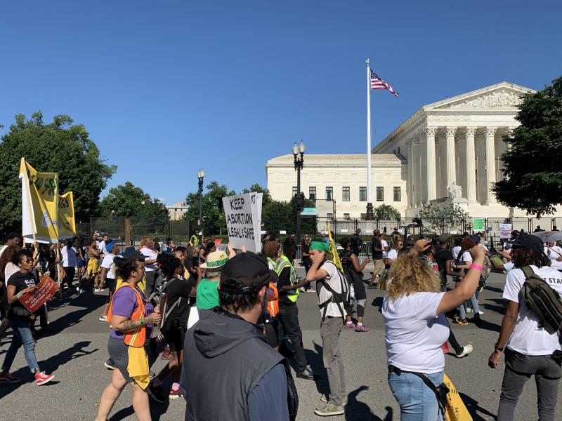 Abortion rights supporters march to the Supreme Court as part of a rally pegged to the Juneteenth holiday weekend. Abortion rights supporters march to the Supreme Court as part of a rally pegged to the Juneteenth holiday weekend.