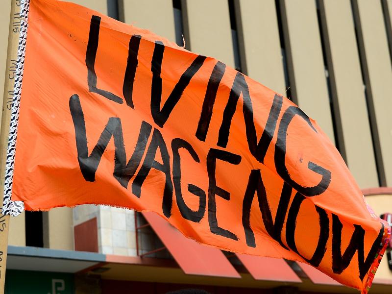 Protesters rally outside a restaurant in St. Louis on Feb. 13. The service industry employs the largest percentage of minimum wage workers. Protesters rally outside a restaurant in St. Louis on Feb. 13. The service industry employs the largest percentage of minimum wage workers.
