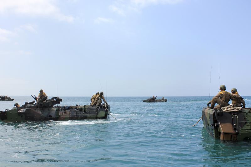 Troops at sea do a towing exercise, where one vehicle is "in distress" and the other has to tow it using ropes. Troops at sea do a towing exercise, where one vehicle is "in distress" and the other has to tow it using ropes.