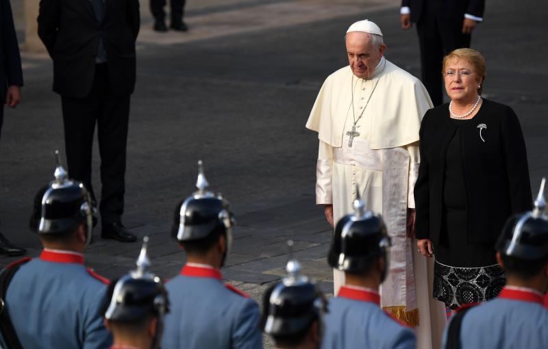 Pope Francis is welcomed by Chile's President Michelle Bachelet at La Moneda Presidential Palace in Santiago on Tuesday. The pope landed in Santiago late Monday on his first visit to Chile since becoming pope, and his sixth to Latin America — a trip tha Pope Francis is welcomed by Chile's President Michelle Bachelet at La Moneda Presidential Palace in Santiago on Tuesday. The pope landed in Santiago late Monday on his first visit to Chile since becoming pope, and his sixth to Latin America — a trip tha