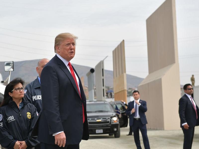 President Trump views prototypes of his long-promised border wall in San Diego on Tuesday. The mockups, which are are still being assessed by officials, stand up to 30 feet tall in the borderlands region of California. President Trump views prototypes of his long-promised border wall in San Diego on Tuesday. The mockups, which are are still being assessed by officials, stand up to 30 feet tall in the borderlands region of California.