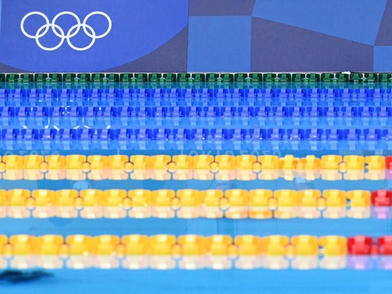 Empty lanes are pictured ahead of a heat for a swimming event during the Tokyo 2020 Olympic Games at the Tokyo Aquatics Center. Empty lanes are pictured ahead of a heat for a swimming event during the Tokyo 2020 Olympic Games at the Tokyo Aquatics Center.