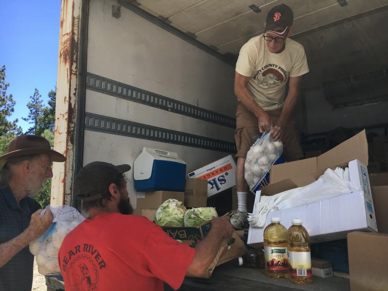Jeff England, director of the Trinity County Food Bank, delivers items in remote Zenia, Calif. The closest large grocery store is 100 miles away. Jeff England, director of the Trinity County Food Bank, delivers items in remote Zenia, Calif. The closest large grocery store is 100 miles away.