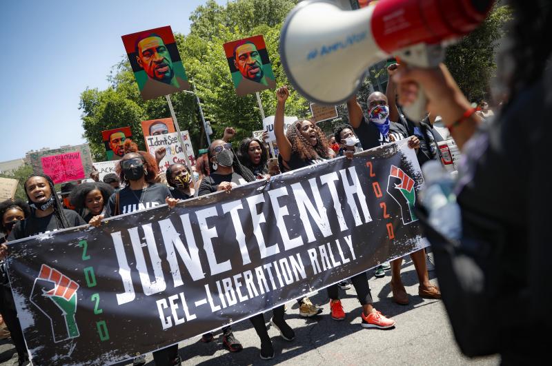 Protesters last year chanted as they marched after a Juneteenth rally at the Brooklyn Museum, in the Brooklyn borough of New York. Protesters last year chanted as they marched after a Juneteenth rally at the Brooklyn Museum, in the Brooklyn borough of New York.