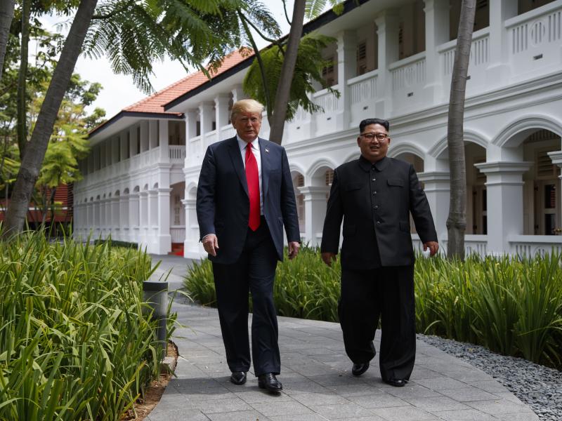 President Donald Trump walks with North Korean leader Kim Jong Un in Singapore in June. President Donald Trump walks with North Korean leader Kim Jong Un in Singapore in June.