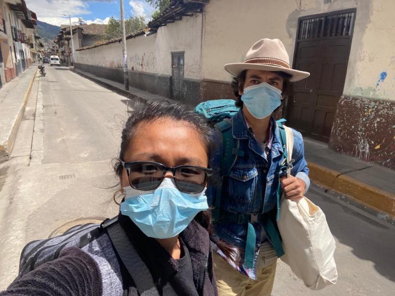 Pu Ying Huang (left) and Dylan Baddour walk along an empty street in Cajamarca, Peru, on March 18, while they were moving from a small hotel room to an Airbnb to ride out the country's 15-day lockdown. Pu Ying Huang (left) and Dylan Baddour walk along an empty street in Cajamarca, Peru, on March 18, while they were moving from a small hotel room to an Airbnb to ride out the country's 15-day lockdown.
