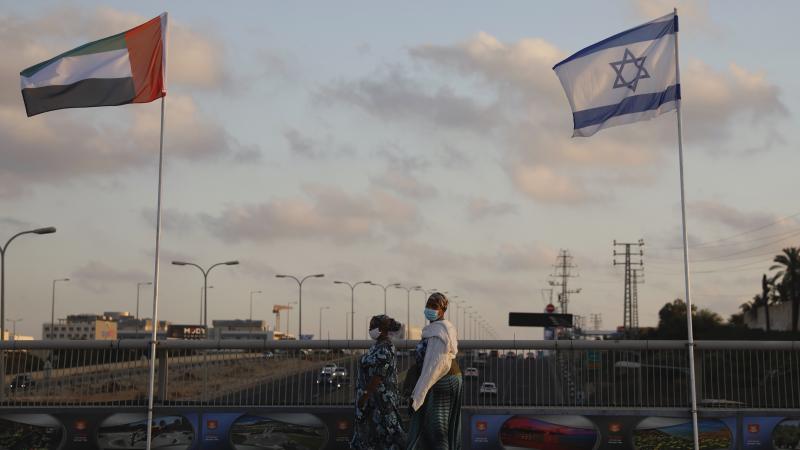 The flags of the United Arab Emirates and Israel are raised on the Peace Bridge in Netanya, Israel. The UAE flag was displayed to celebrate last week's announcement that the two countries have agreed to establish diplomatic relations. The flags of the United Arab Emirates and Israel are raised on the Peace Bridge in Netanya, Israel. The UAE flag was displayed to celebrate last week's announcement that the two countries have agreed to establish diplomatic relations.