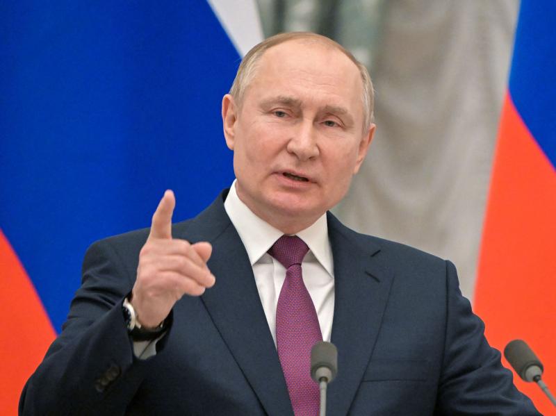 Russian President Vladimir Putin speaks during a joint news conference with Germany's chancellor following their meeting at the Kremlin, in Moscow, on Tuesday. That day the Kremlin said it pulled back some Russian troops but the U.S. and NATO have rejecte Russian President Vladimir Putin speaks during a joint news conference with Germany's chancellor following their meeting at the Kremlin, in Moscow, on Tuesday. That day the Kremlin said it pulled back some Russian troops but the U.S. and NATO have rejecte
