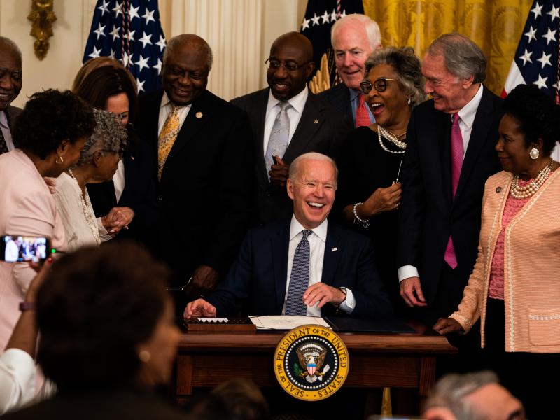 President Joe Biden is joined by Vice President Kamala Harris and members of Congress at the signing the Juneteenth National Independence Day Act into law in the East Room of the White House on June 17, 2021. President Joe Biden is joined by Vice President Kamala Harris and members of Congress at the signing the Juneteenth National Independence Day Act into law in the East Room of the White House on June 17, 2021.