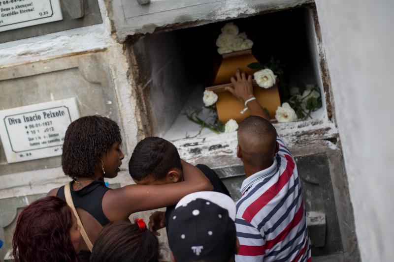 Relatives and friends of Eduardo Felipe Santos Victor, a teenager who was shot dead in Morro da Providencia, a low-income favela community, mourn during his funeral in Rio de Janeiro, on Sept. 30, 2015. Relatives and friends of Eduardo Felipe Santos Victor, a teenager who was shot dead in Morro da Providencia, a low-income favela community, mourn during his funeral in Rio de Janeiro, on Sept. 30, 2015.