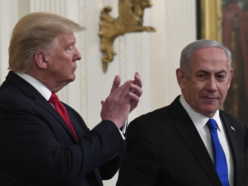 President Donald Trump applauds as Israeli Prime Minister Benjamin Netanyahu speaks during Tuesday's announcement of the Trump administration's plan to resolve the Israeli-Palestinian conflict. President Donald Trump applauds as Israeli Prime Minister Benjamin Netanyahu speaks during Tuesday's announcement of the Trump administration's plan to resolve the Israeli-Palestinian conflict.