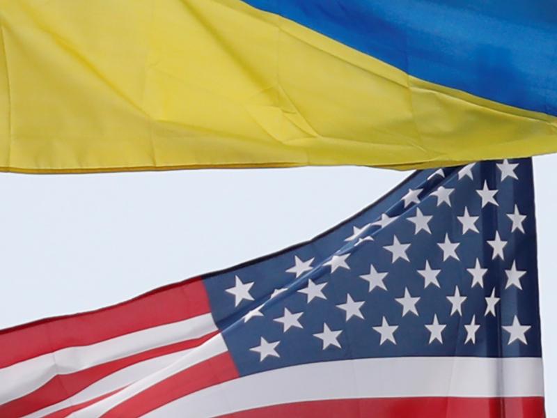 Ukrainian and U.S. flags fly in Kyiv, Ukraine. Ukrainian and U.S. flags fly in Kyiv, Ukraine.