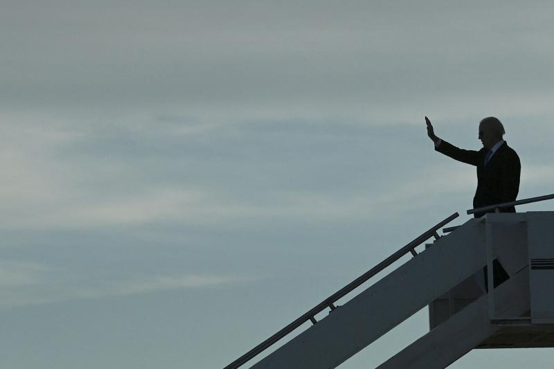 President Biden waves as he prepares to depart the airport after meeting with Russian President Vladimir Putin in Geneva, on June 16. President Biden waves as he prepares to depart the airport after meeting with Russian President Vladimir Putin in Geneva, on June 16.