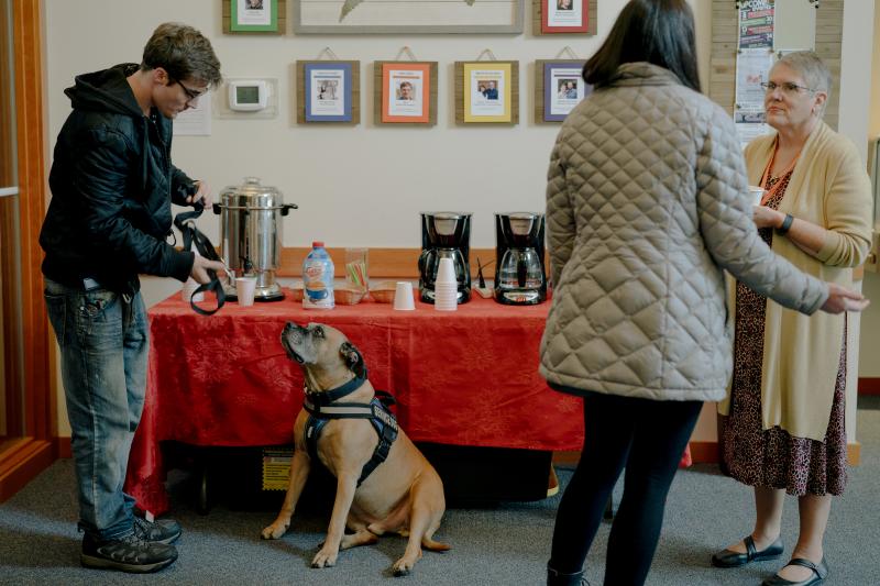 Harrison Schapelhouman (left) with his service dog outside True Hope Community Church in Issaquah, Wash., on Dec. 8. Schapelhouman's service dog, who he's had since he lived on the streets, has helped him throughout his recovery from addiction. Harrison Schapelhouman (left) with his service dog outside True Hope Community Church in Issaquah, Wash., on Dec. 8. Schapelhouman's service dog, who he's had since he lived on the streets, has helped him throughout his recovery from addiction.