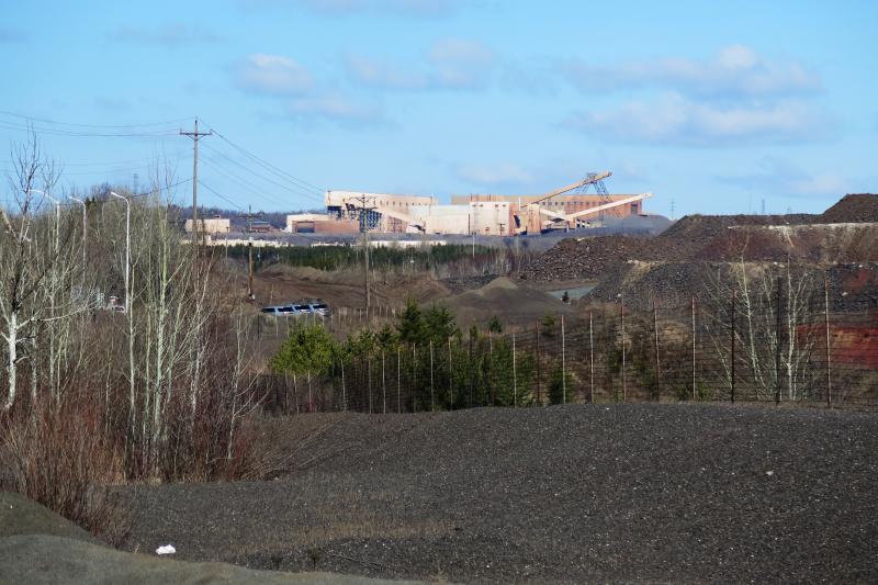U.S. Steel's Minntac taconite mine and plant looms over the city of Virginia. The company plans to lay off around 700 employees on June 1. U.S. Steel's Minntac taconite mine and plant looms over the city of Virginia. The company plans to lay off around 700 employees on June 1.