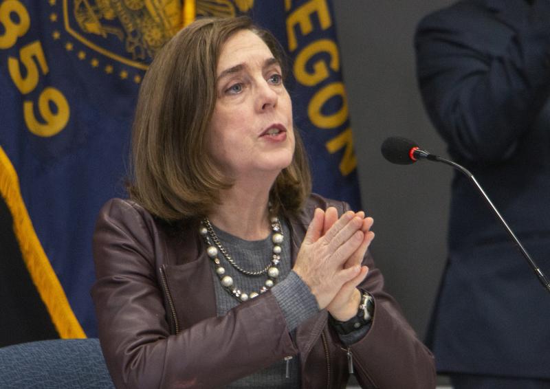 Oregon Gov. Kate Brown (shown here on Nov. 10) has ordered new statewide restrictions to head off a resurgence in coronavirus cases. Oregon Gov. Kate Brown (shown here on Nov. 10) has ordered new statewide restrictions to head off a resurgence in coronavirus cases.