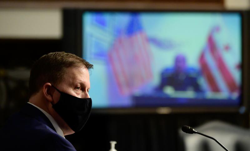 Former U.S. Capitol Police Chief Steven Sund testifies during a Senate Homeland Security and Rules joint hearing on Monday about the insurrection on Jan. 6. Former U.S. Capitol Police Chief Steven Sund testifies during a Senate Homeland Security and Rules joint hearing on Monday about the insurrection on Jan. 6.