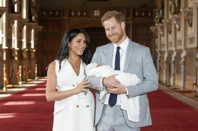 Britain's Prince Harry and Meghan, Duke and Duchess of Sussex, hold their newborn son in St. George's Hall at Windsor Castle on Wednesday. Archie Harrison Mountbatten-Windsor was born Monday morning. Britain's Prince Harry and Meghan, Duke and Duchess of Sussex, hold their newborn son in St. George's Hall at Windsor Castle on Wednesday. Archie Harrison Mountbatten-Windsor was born Monday morning.