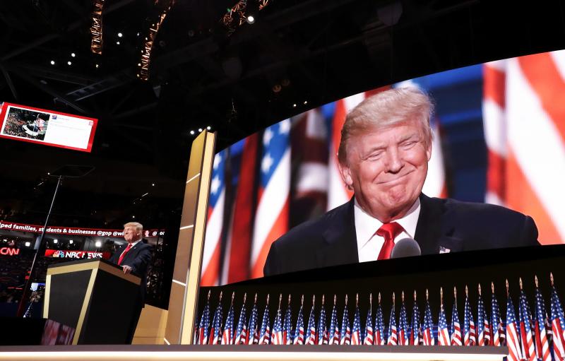 Republican presidential candidate Donald Trump delivers his speech on the final evening of the Republican National Convention in Cleveland. Republican presidential candidate Donald Trump delivers his speech on the final evening of the Republican National Convention in Cleveland.