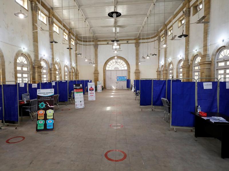 The Khaliq Dina Hall and Library building in Karachi, Pakistan, has been converted into a COVID-19 vaccination center. The Khaliq Dina Hall and Library building in Karachi, Pakistan, has been converted into a COVID-19 vaccination center.