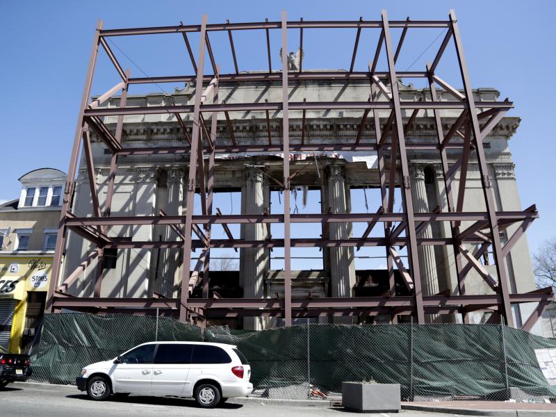 The facade of a former bank is turned into residential housing in 2018 in an "opportunity zone" in Newark, N.J. The facade of a former bank is turned into residential housing in 2018 in an "opportunity zone" in Newark, N.J.
