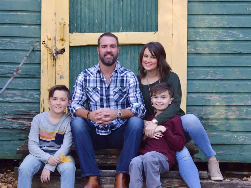 Brittany Schwaigert with her husband, Ryan, 13-year-old Greyson (far right) and 10-year-old Lachlan. Schwaigert is a lead plaintiff in a class action lawsuit challenging the Tennessee governor's opt-out policy on masks. Brittany Schwaigert with her husband, Ryan, 13-year-old Greyson (far right) and 10-year-old Lachlan. Schwaigert is a lead plaintiff in a class action lawsuit challenging the Tennessee governor's opt-out policy on masks.