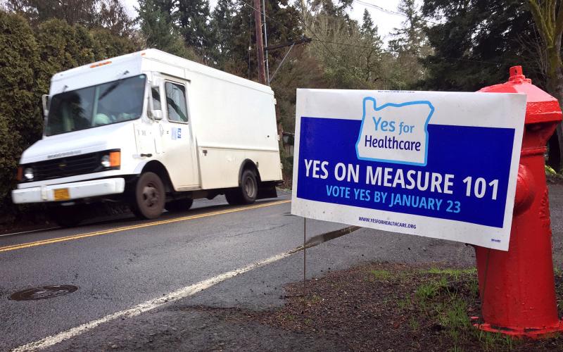 A sign in support of Oregon's Measure 101 is displayed by a homeowner along a roadside in Lake Oswego, Ore. Tuesday's special election puts decisions over how the state funds Medicaid in voters' hands. A sign in support of Oregon's Measure 101 is displayed by a homeowner along a roadside in Lake Oswego, Ore. Tuesday's special election puts decisions over how the state funds Medicaid in voters' hands.