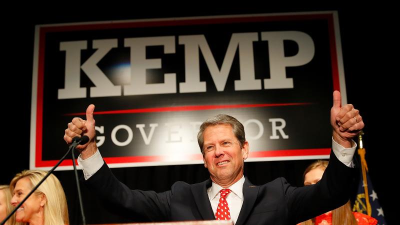 Then-Georgia Secretary of State, and Republican nominee for governor, Brian Kemp attends an election night event in Athens, Georgia. As secretary of state, Kemp was charged with overseeing the election logistics for the election he was running in. Then-Georgia Secretary of State, and Republican nominee for governor, Brian Kemp attends an election night event in Athens, Georgia. As secretary of state, Kemp was charged with overseeing the election logistics for the election he was running in.