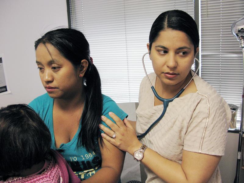 Dr. Charu Sawhney examines patient Mang Caan. Sawhney supports the Affordable Care Act, but has been frustrated by how difficult it is to find specialists who accept some of the plans her patients bought. Dr. Charu Sawhney examines patient Mang Caan. Sawhney supports the Affordable Care Act, but has been frustrated by how difficult it is to find specialists who accept some of the plans her patients bought.