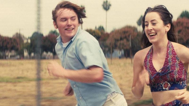 Cooper Hoffman and Alana Haim are unlikely friends in Licorice Pizza. Cooper Hoffman and Alana Haim are unlikely friends in Licorice Pizza.
