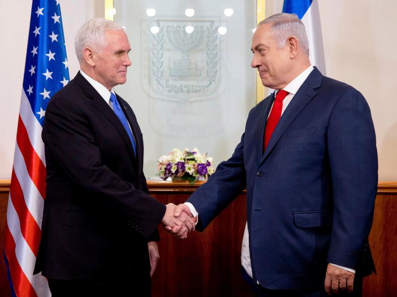 Vice President Pence (left) shakes hands with Israeli Prime Minister Benjamin Netanyahu during their meeting at the prime minister's office in Jerusalem on Monday. The visit, initially scheduled for December before being postponed, is the final leg of a t Vice President Pence (left) shakes hands with Israeli Prime Minister Benjamin Netanyahu during their meeting at the prime minister's office in Jerusalem on Monday. The visit, initially scheduled for December before being postponed, is the final leg of a t