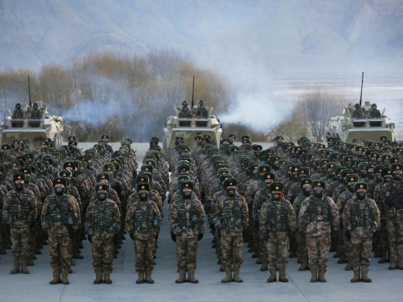 This Jan. 4 photo shows Chinese People's Liberation Army soldiers assembling during military training at Pamir Mountains in Kashgar, northwestern China's Xinjiang region. This Jan. 4 photo shows Chinese People's Liberation Army soldiers assembling during military training at Pamir Mountains in Kashgar, northwestern China's Xinjiang region.