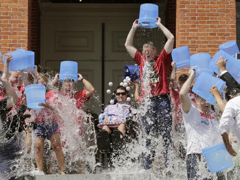Pete Frates, (seated, center) participates in the Ice Bucket Challenge with Massachusetts Gov. Charlie Baker to raise money for ALS research at the Statehouse in Boston in 2015. Pete Frates, (seated, center) participates in the Ice Bucket Challenge with Massachusetts Gov. Charlie Baker to raise money for ALS research at the Statehouse in Boston in 2015.