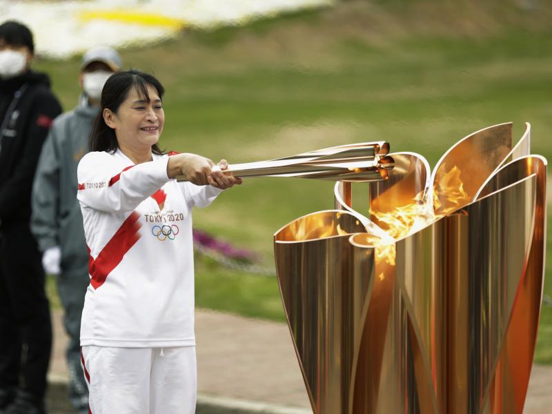 The last Olympic torch relay runner for the Osaka leg concludes the event in Suita, north of Osaka, western Japan, last month. The last Olympic torch relay runner for the Osaka leg concludes the event in Suita, north of Osaka, western Japan, last month.