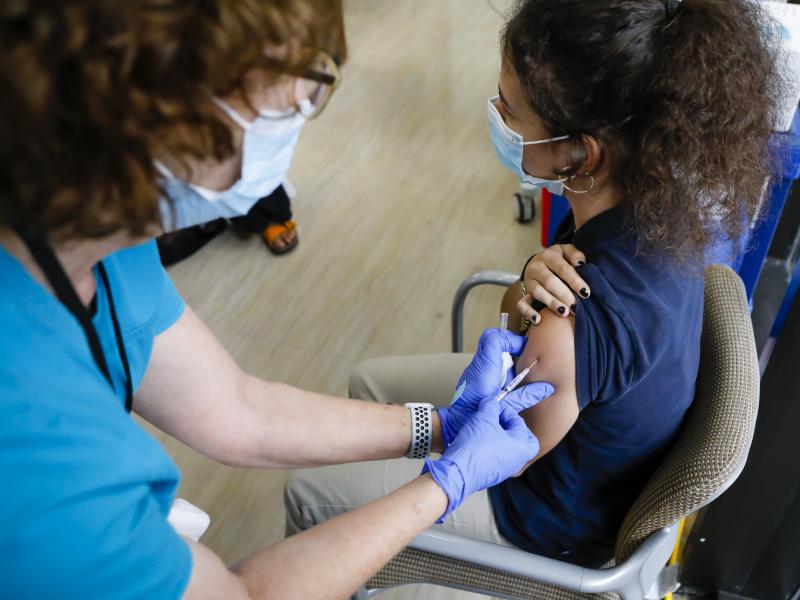 A teen gets a dose of Pfizer's COVID-19 vaccine last month at Holtz Children's Hospital in Miami. Nearly 7 million U.S. teens and preteens (ages 12 through 17) have received at least one dose of a COVID-19 vaccine so far, the CDC says. A teen gets a dose of Pfizer's COVID-19 vaccine last month at Holtz Children's Hospital in Miami. Nearly 7 million U.S. teens and preteens (ages 12 through 17) have received at least one dose of a COVID-19 vaccine so far, the CDC says.