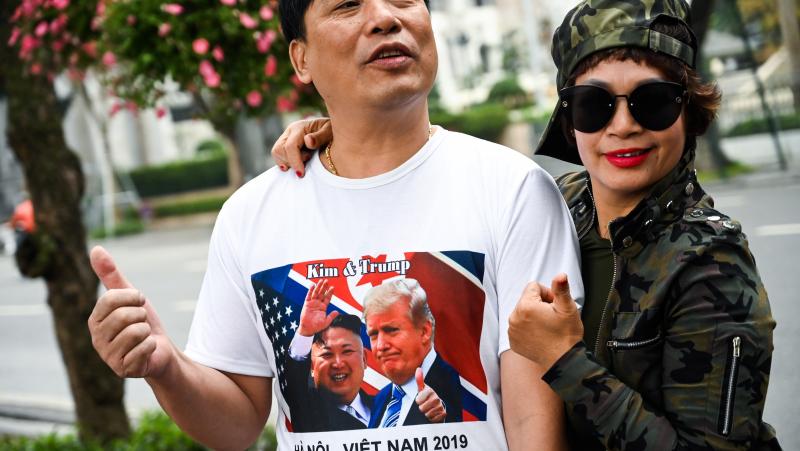 A man wearing a T-shirt featuring pictures of President Trump and North Korean leader Kim Jong Un poses near the Sofitel Legend Metropole hotel in Hanoi on Wednesday. A man wearing a T-shirt featuring pictures of President Trump and North Korean leader Kim Jong Un poses near the Sofitel Legend Metropole hotel in Hanoi on Wednesday.